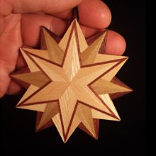 12 Point Star In Hand 12 Point Star In Hand