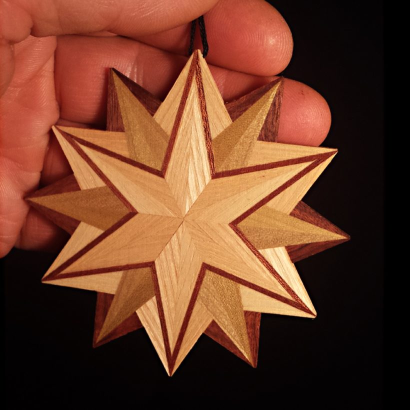 12 Point Star In Hand 12 Point Star In Hand